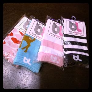 4 Pairs of baby leggings.